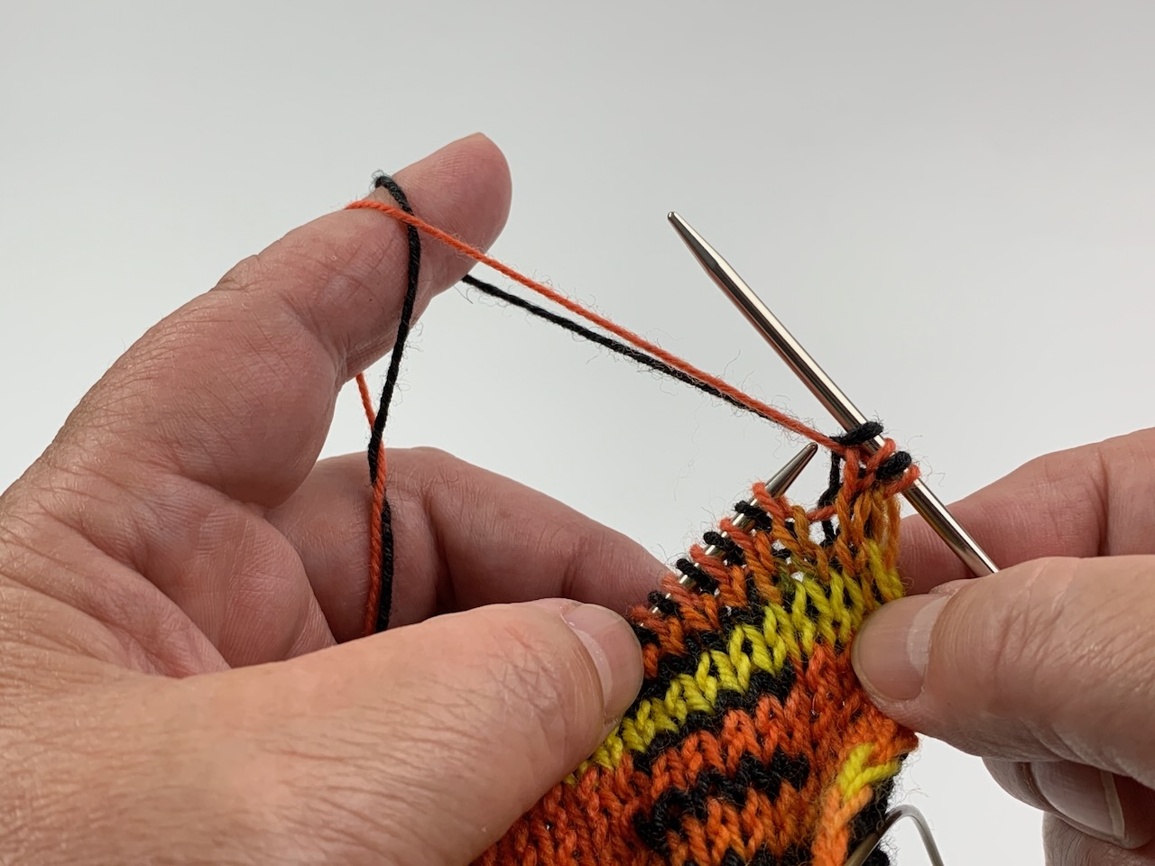 Fadenhaltung bei der Doubleface-Technik