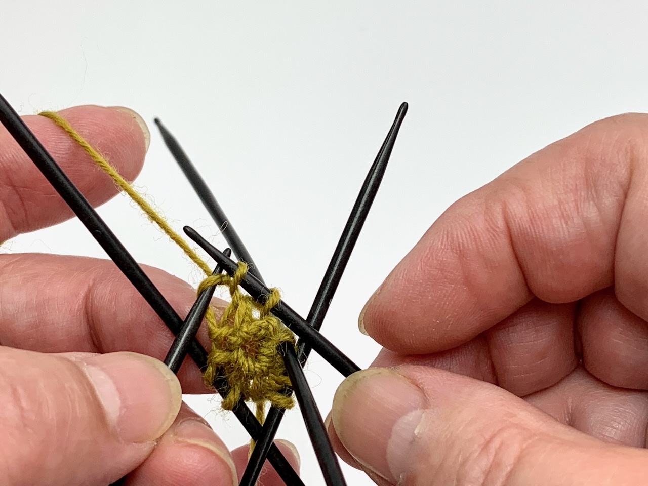 Das Verdoppeln einer Masche für die Propellerspitze