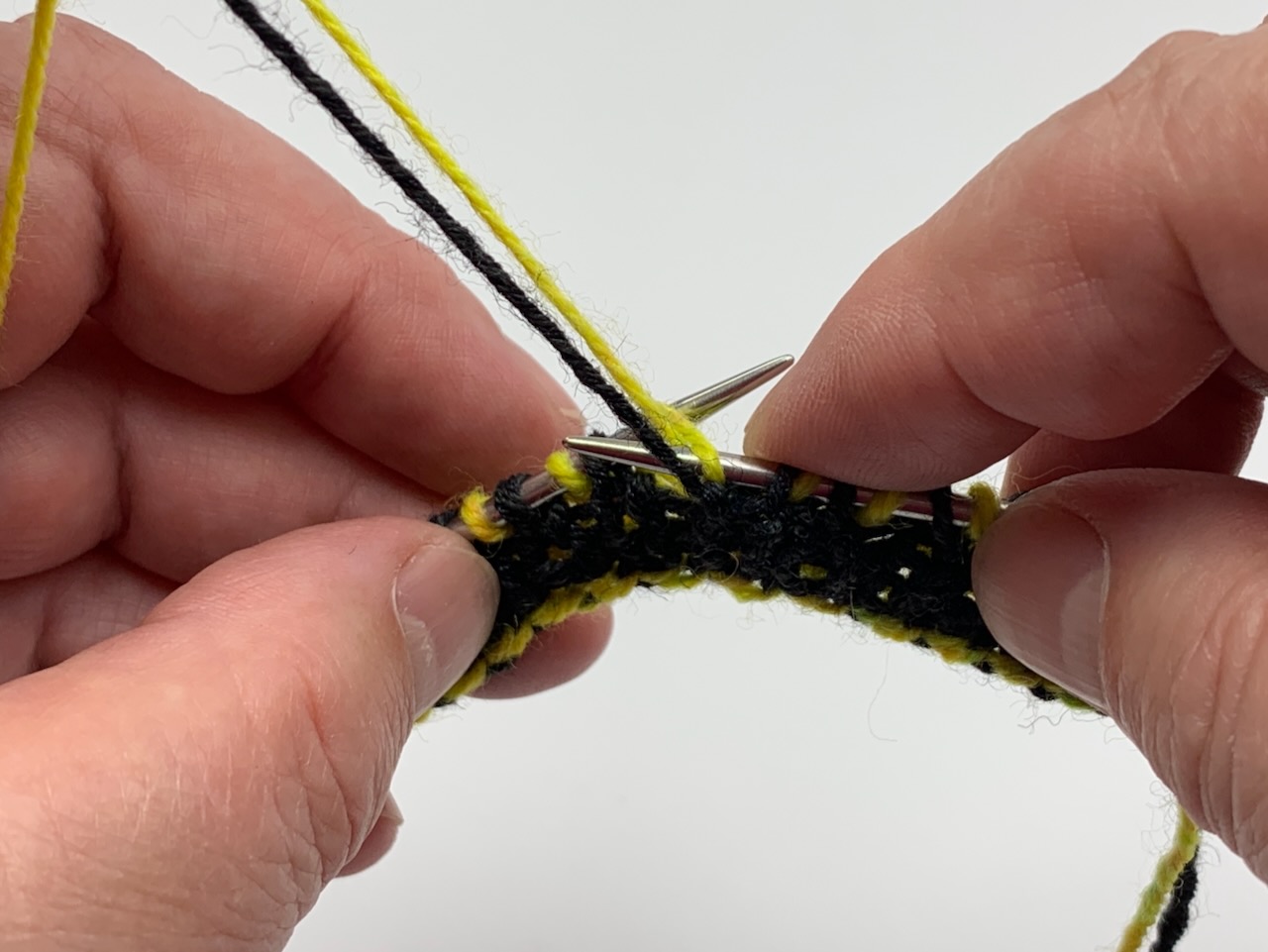 Linke Maschen beim Doubleface Stricken.